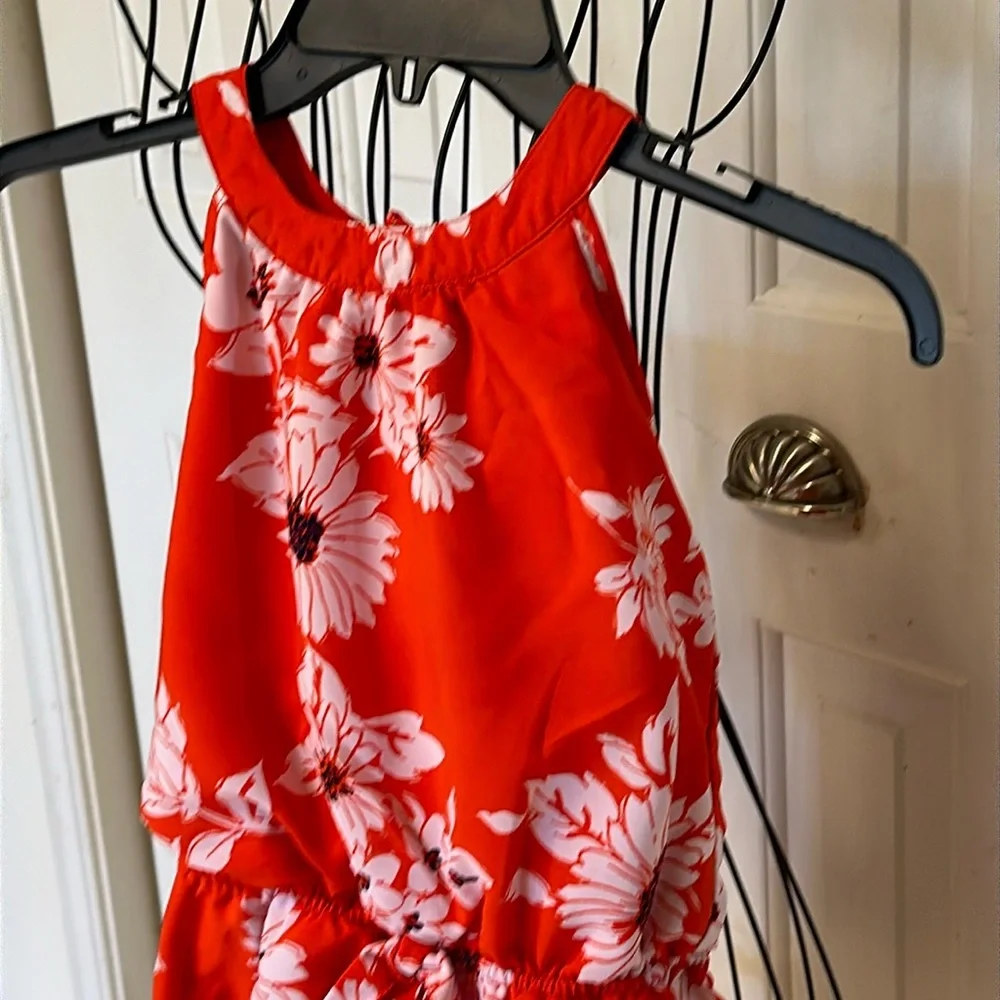 My Michelle girls floral romper orang & white one button bow in back. si…